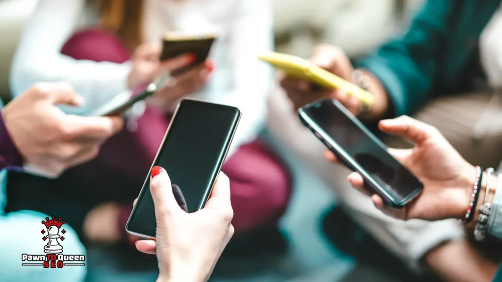 persone che usano telefoni mobili